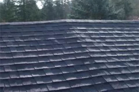 Sagging shingles. Reroofing shingles