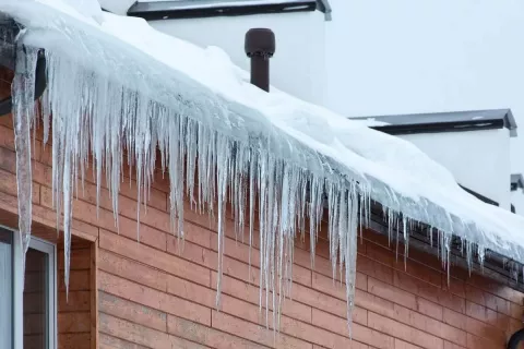 Ice on shingle roof