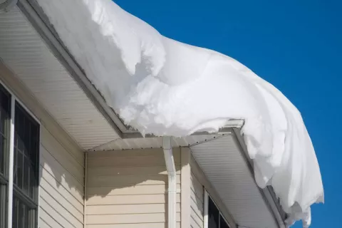 Snow on shingle roof