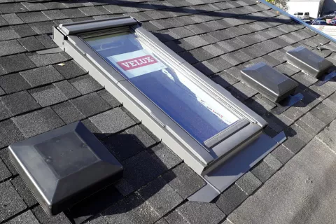 Skylight in shingle roof