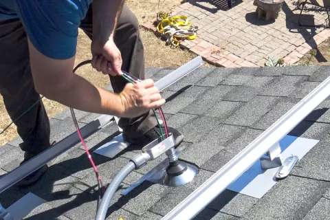 Electric cables from PV panels pass through the roof through the roof outlet