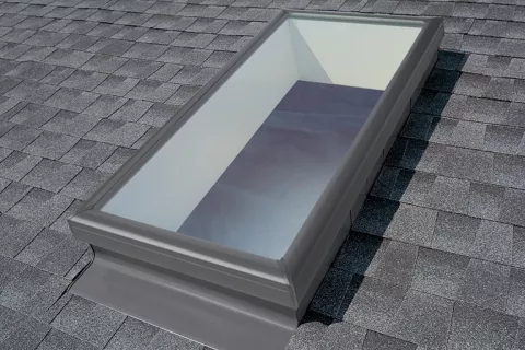 Skylight in shingle roof