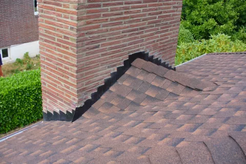 Flashing around chimney on shingles roof