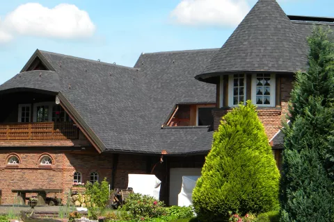 Cone shaped roof details after shingle application