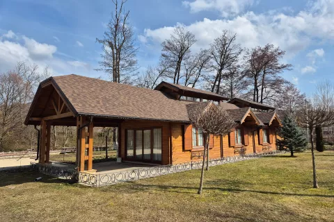 Guarantee: roof with Cambridge shingles in color Autumn Brown (53)