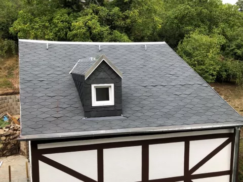 Failed shingle roof due to lack of ventilation