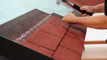 Properly nailing roof shingle